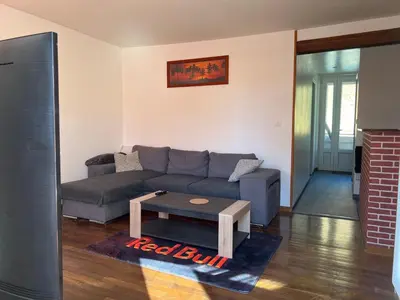Coin salon dans l'établissement 0 rdc Appartement centre flers proche commerces et gare