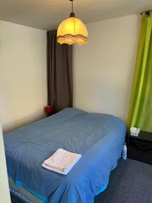 Un ou plusieurs lits dans un hébergement de l'établissement 0 rdc Appartement centre flers proche commerces et gare