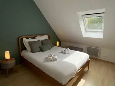 Un ou plusieurs lits dans un hébergement de l'établissement Maison calme avec terrasse - Calypso