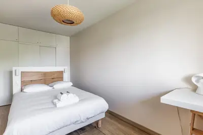 Un ou plusieurs lits dans un hébergement de l'établissement Appartement Fellas - Welkeys