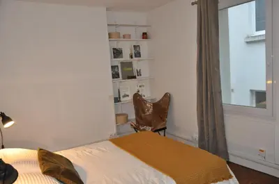 Un ou plusieurs lits dans un hébergement de l'établissement CAEN : appartement Cosy hyper centre historique