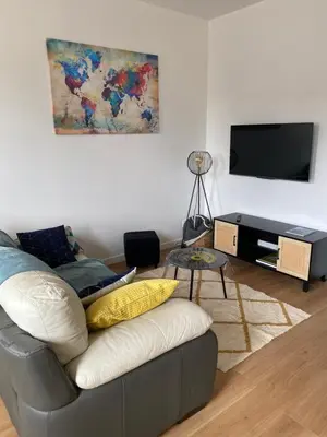 Télévision ou salle de divertissement dans l'établissement Gîte mont-blan