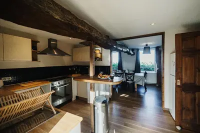 Cuisine ou kitchenette dans l'établissement La Bergerie Chaleureux Cottage en Bord de Mer