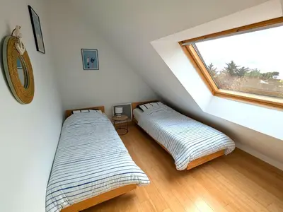 Un ou plusieurs lits dans un hébergement de l'établissement Duplex vue mer tout confort a la Croix Paqueray