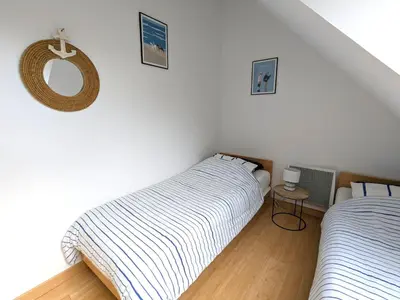 Un ou plusieurs lits dans un hébergement de l'établissement Duplex vue mer tout confort a la Croix Paqueray