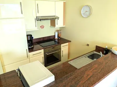 Cuisine ou kitchenette dans l'établissement Duplex vue mer tout confort a la Croix Paqueray