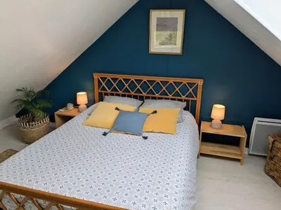 Un ou plusieurs lits dans un hébergement de l'établissement La petite enseigne - Chez Hélène - Gîtes en baie