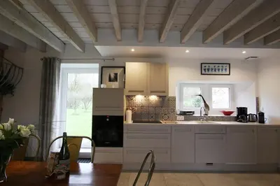 Cuisine ou kitchenette dans l'établissement Gîte Au fil de l'eau