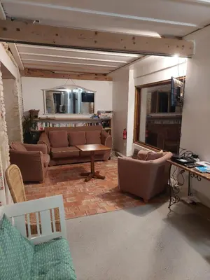 Coin salon dans l'établissement La Bergerie de Bénéauville 7 personnes