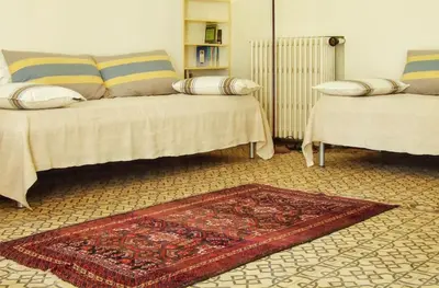 Un ou plusieurs lits dans un hébergement de l'établissement Maison charmante à Ryes avec jardin clos et accès PMR