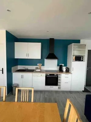 Cuisine ou kitchenette dans l'établissement Grain de café Barneville Plage