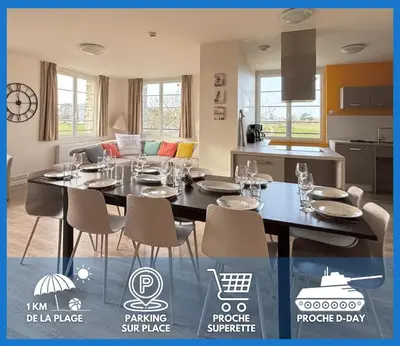 Cuisine ou kitchenette dans l'établissement Les sables d'or Grand apt lumineux bien équipé 1er étage vue panoramique sur campagne près superette, à 600 m plage proche Omaha Beach et pointe du Hoc parking gratuit, garage à disposition