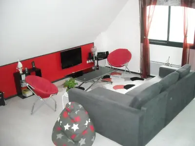 Coin salon dans l'établissement Les granvillaises