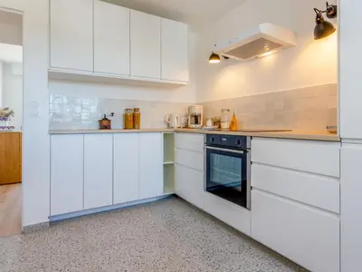Cuisine ou kitchenette dans l'établissement Apartment Les Mouettes by Interhome