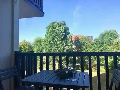 Balcon ou terrasse dans l'établissement Cabourg T2 tout neuf Accès direct mer Grand balcon