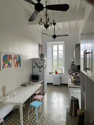 Cuisine ou kitchenette dans l'établissement La Grande Rocque