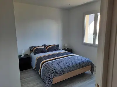 Un ou plusieurs lits dans un hébergement de l'établissement Maison neuve proche de la mer