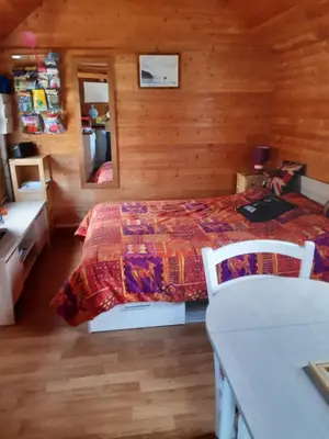 Un ou plusieurs lits dans un hébergement de l'établissement Chalet insolite