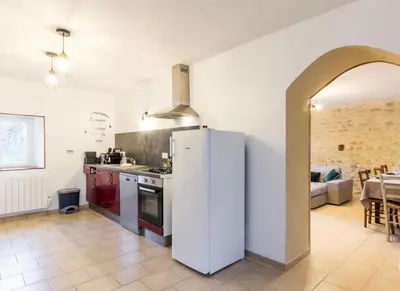 Cuisine ou kitchenette dans l'établissement L'Îlot Pomme Cottage