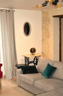 Coin salon dans l'établissement L'Îlot Pomme Cottage