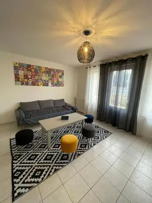 Coin salon dans l'établissement Maison bord de mer Chez JuJu