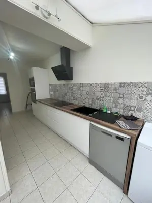 Cuisine ou kitchenette dans l'établissement Maison bord de mer Chez JuJu