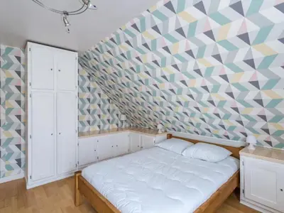 Un ou plusieurs lits dans un hébergement de l'établissement Holiday Home La Perle by Interhome