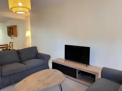 Télévision ou salle de divertissement dans l'établissement Le Mulberry - Collection La 21ème Planche