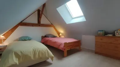 Un ou plusieurs lits dans un hébergement de l'établissement Eco-gîte à la Ferme d'Elles