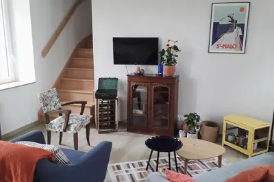Télévision ou salle de divertissement dans l'établissement Vue mer pour une escale en baie du Mt-St-Michel
