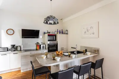 Cuisine ou kitchenette dans l'établissement Le Tangon - Maison de 150m2 face à la mer