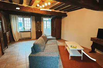 Télévision ou salle de divertissement dans l'établissement Chez Alice - Isigny le Buat