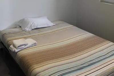 Un ou plusieurs lits dans un hébergement de l'établissement Hôtel et Restaurant de la Gare Torigny-les-Villes