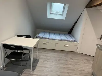 Un ou plusieurs lits dans un hébergement de l'établissement 2 Appartement neuf centre ville proche gare et commerces