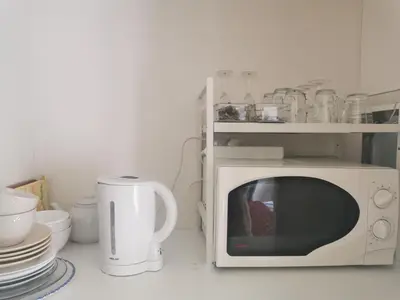 Cuisine ou kitchenette dans l'établissement Villa Athena, séjour bien-être et éthique