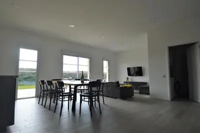 Télévision ou salle de divertissement dans l'établissement Saint Côme Beach House