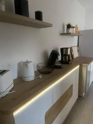 Cuisine ou kitchenette dans l'établissement Gite comme chez soi Ducey les Chèris