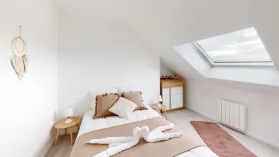 Un ou plusieurs lits dans un hébergement de l'établissement Appartement Les Sables d’Or