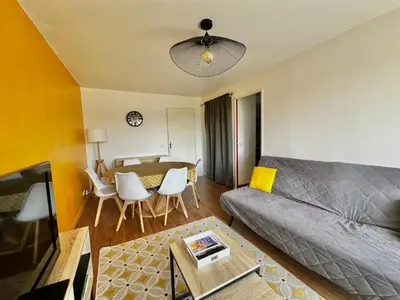 Coin salon dans l'établissement Capucine, duplex à 5 min plage