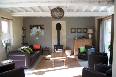 Coin salon dans l'établissement Maison Bel'Air Bayeux