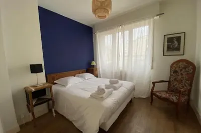 Un ou plusieurs lits dans un hébergement de l'établissement Charming 44m near downtown