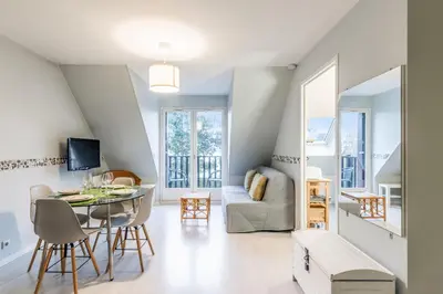 Télévision ou salle de divertissement dans l'établissement Appartement Cassulo - Welkeys