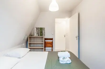 Un ou plusieurs lits dans un hébergement de l'établissement Appartement Cassulo - Welkeys