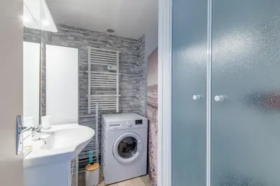 Salle de bains dans l'établissement Les Etrilles