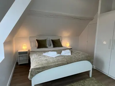 Un ou plusieurs lits dans un hébergement de l'établissement Bella, Joli appt rénové dans le bourg