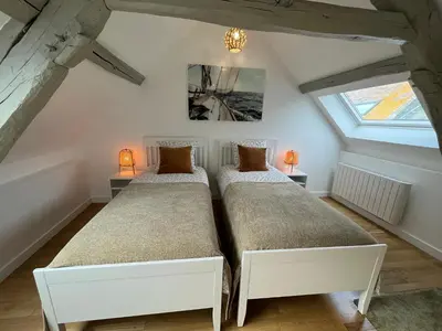 Un ou plusieurs lits dans un hébergement de l'établissement Bella, Joli appt rénové dans le bourg