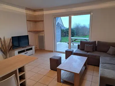 Coin salon dans l'établissement Cottage Le Cabanon