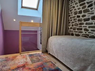 Un ou plusieurs lits dans un hébergement de l'établissement Gîte de la Filuzière