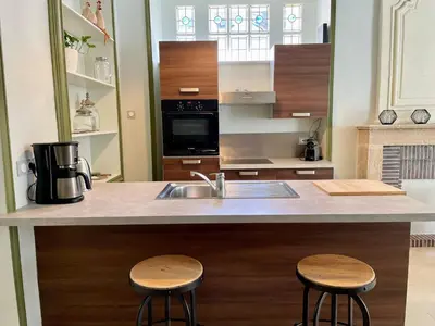 Cuisine ou kitchenette dans l'établissement Le Petit Malo - Collection La 21ème Planche