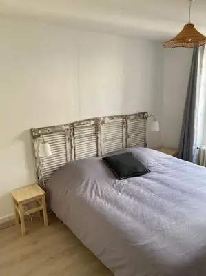 Un ou plusieurs lits dans un hébergement de l'établissement Appartement Les Corsaires